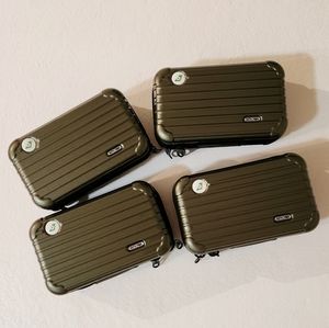Four (4) Piece RIMOWA First Class Toiletry Zipper Pouches